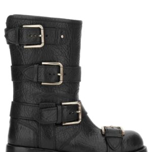Explore the authentic Dolce & Gabbana women's LEATHER BOOT WITH BUCKLES in Black