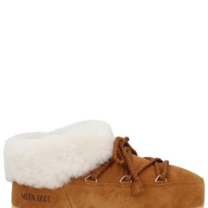 Refresh your wardrobe with the Moon Boot unisex LEATHER "EVX" MULES in beige