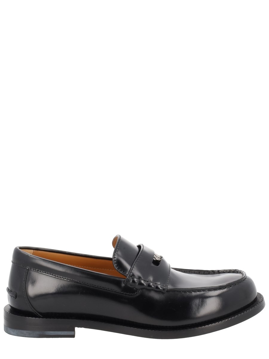 Discover the authentic Gucci men's LEATHER LOAFER in Black