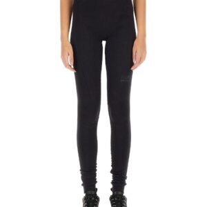 Discover the authentic MM6 MAISON MARGIELA X SALOMON women's LEGGINGS WITH LOGO in Black