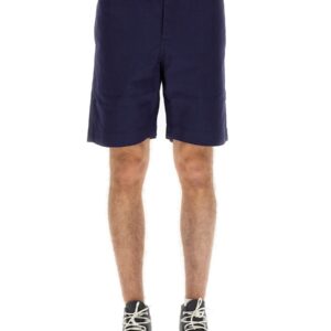 Refresh your wardrobe with the UMBRO X YMC men's LOGO PATCH BERMUDA in Blue