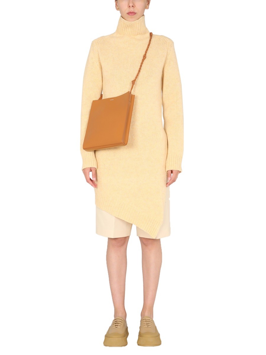 Explore the authentic JIL SANDER women's LONG ASYMMETRIC SWEATER in Yellow