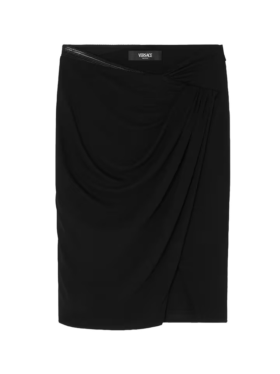 Explore the authentic Versace women's MIDI SKIRT WITH ASYMMETRICAL HEMLINE in Black