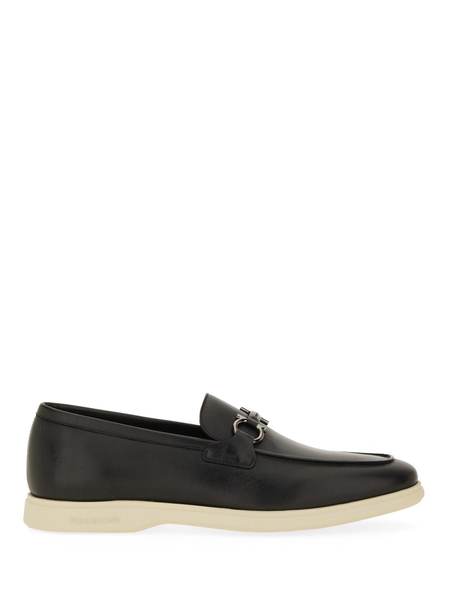 Refresh your wardrobe with the Ferragamo men's MOCCASIN "GANCINI" in Black