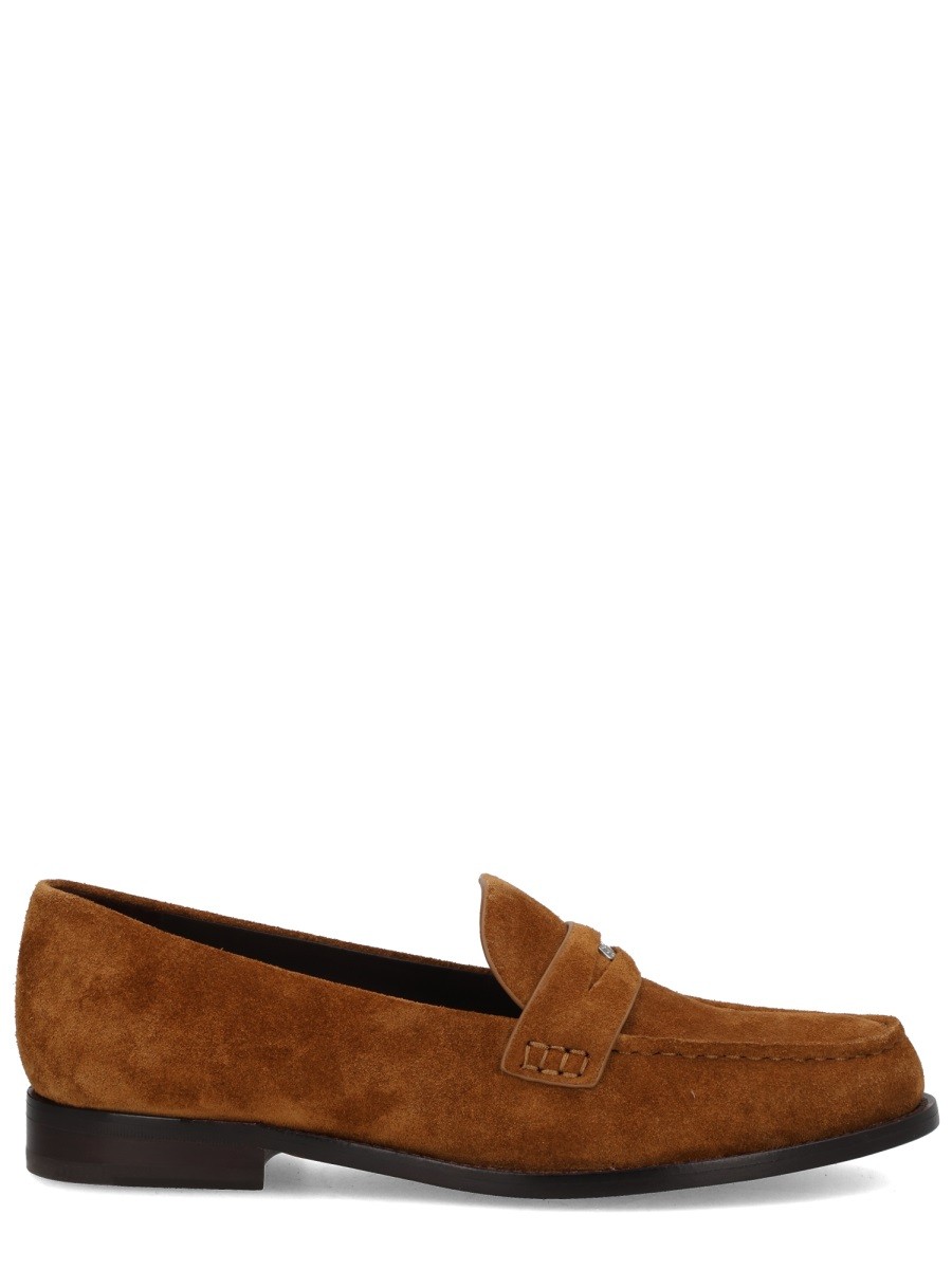 Refresh your wardrobe with the Tory Burch women's MOCCASIN "PENNY" in Brown