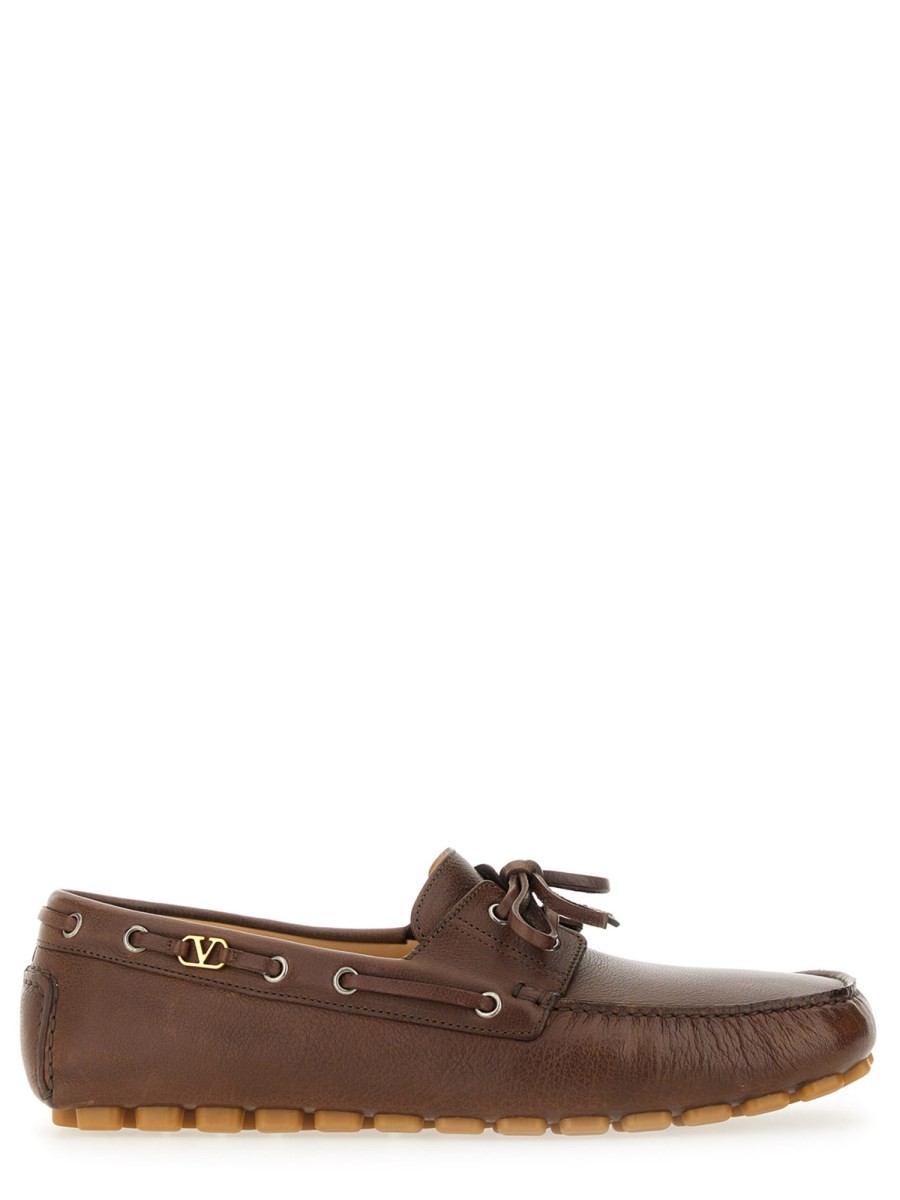 Explore the authentic Valentino Garavani men's MOCCASIN "VLOGO SIGNATURE" in Brown
