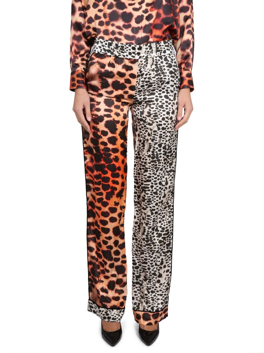 Explore the authentic ROBERTO CAVALLI women's MORAY EEL PRINT PANTS in Pink