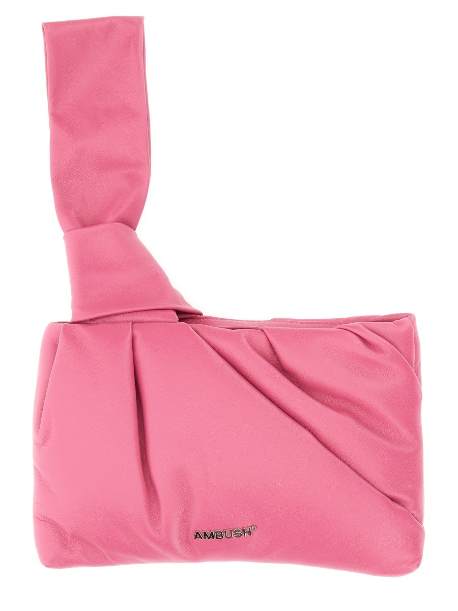 Discover the authentic AMBUSH women's NEJIRI WRIST CLUTCH in Lilac