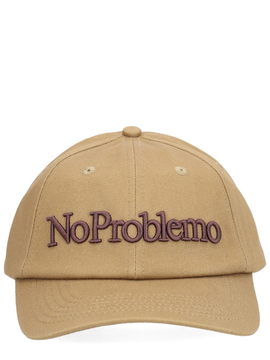 Explore the authentic NO PROBLEMO unisex "NO PROBLEMO" BASEBALL CAP in Brown
