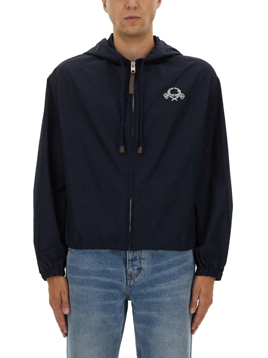 Refresh your wardrobe with the Moschino men's NYLON JACKET in Blue