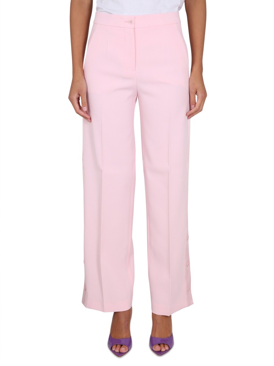 Discover the authentic Boutique Moschino women's PANTS WITH BUTTONS in Pink
