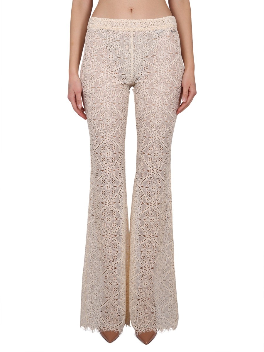 Refresh your wardrobe with the Dsquared2 women's PANTS WITH EMBROIDERY in POWDER
