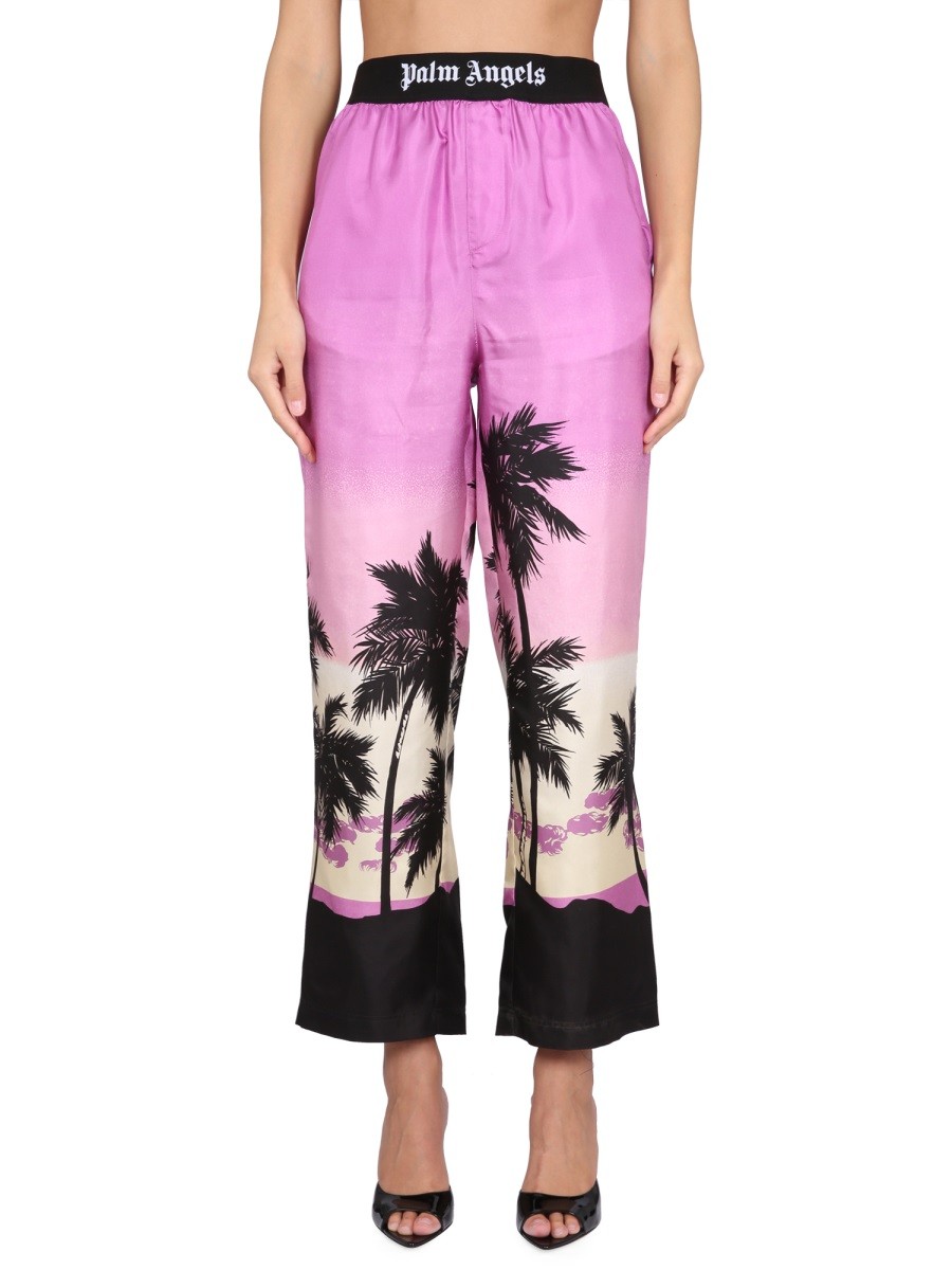 Discover the authentic Palm Angels women's PANTS WITH SUNSET PRINT in Purple