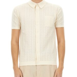 Explore the authentic Dolce & Gabbana men's PERFORATED COTTON KNIT SHIRT in White