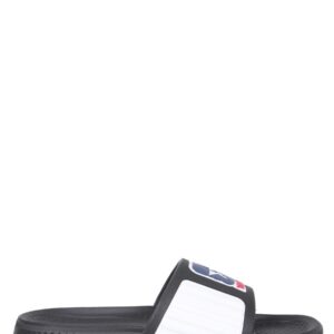 Explore the authentic TELFAR X CONVERSE women's RUBBER SLIDE SANDALS in Black