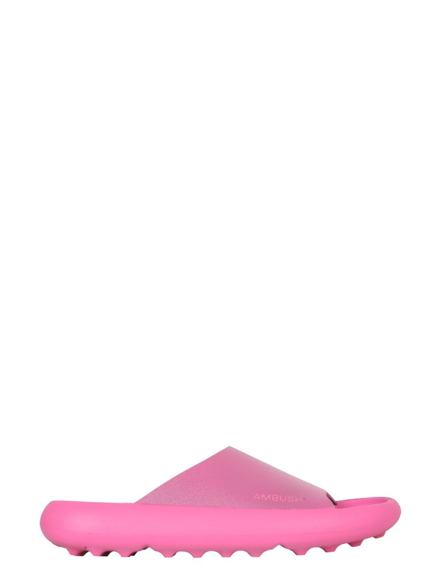 Discover the authentic AMBUSH women's RUBBER SLIDE SANDALS in Fuchsia