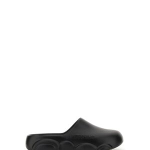 Refresh your wardrobe with the Moschino women's RUBBER TEDDY SOLE MULES in Black