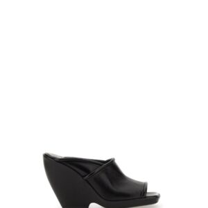 Explore the authentic KHAITE women's SANDALS MULES THE STAGG 105MM in Black