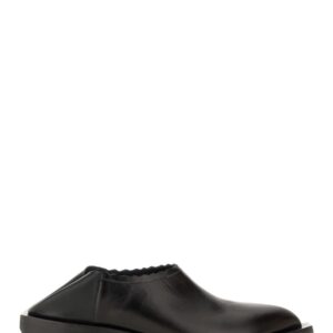 Refresh your wardrobe with the Moschino women's SHOOTIE CUBAN HEEL in Black