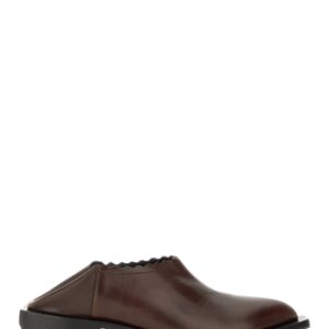 Refresh your wardrobe with the Moschino women's SHOOTIE CUBAN HEEL in Brown