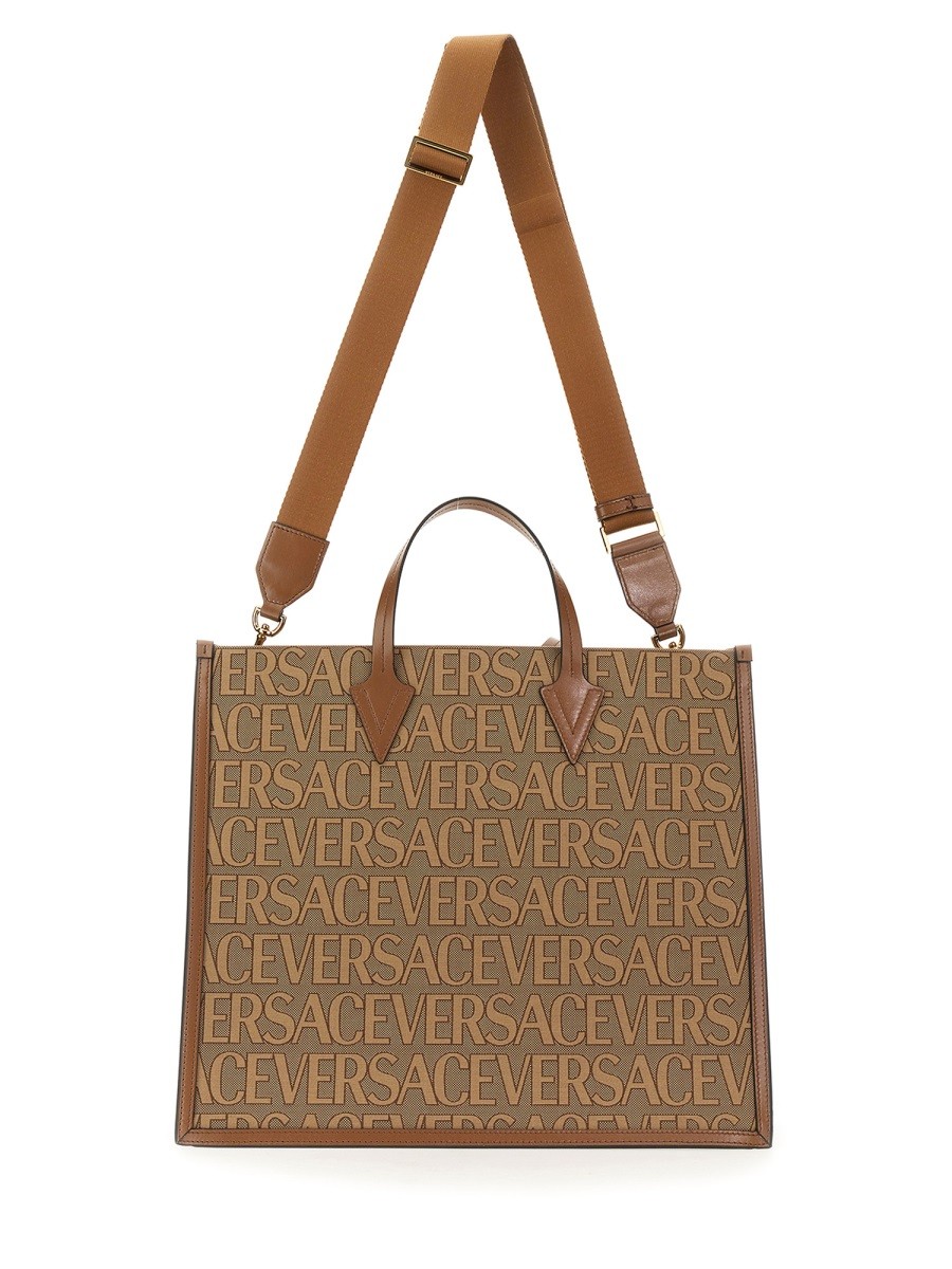 Explore the authentic Versace men's SHOPPER BAG WITH ALLOVER LOGO in MULTICOLOUR