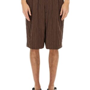 Refresh your wardrobe with the Dries Van Noten men's SHORT PLEATED in Brown