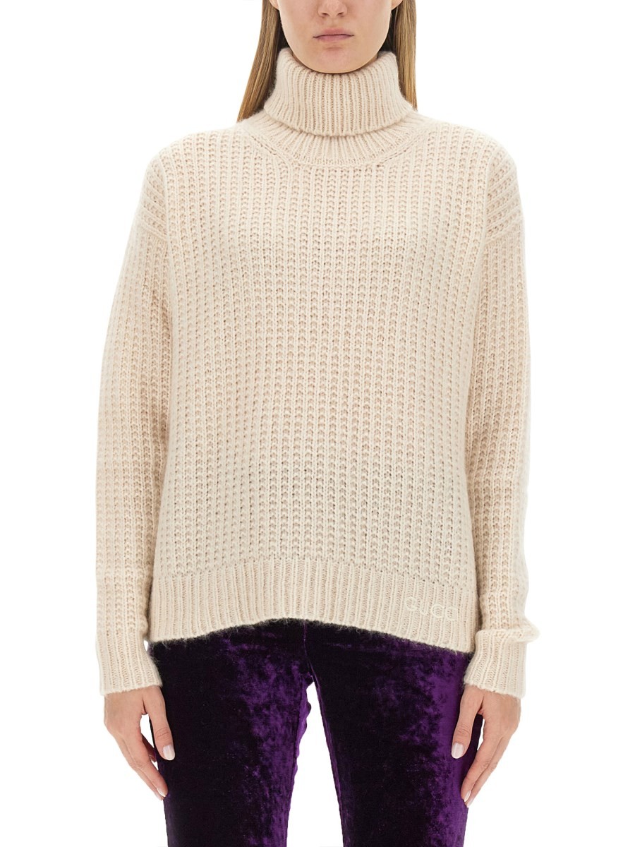 Explore the authentic Gucci women's SILK AND CASHMERE TURTLENECK SWEATER in Ivory