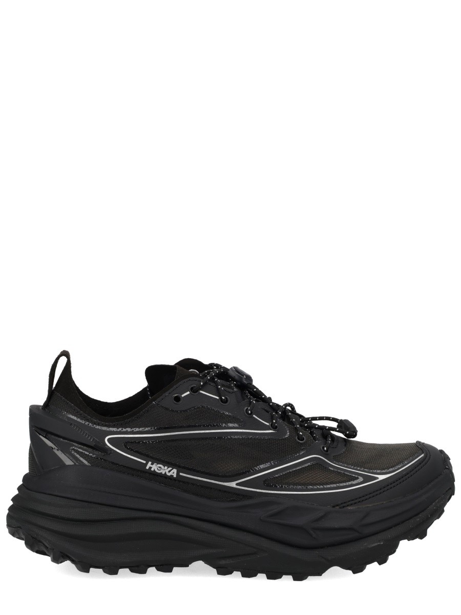 Refresh your wardrobe with the HOKA unisex "STINSON ONE7" SNEAKER in Black