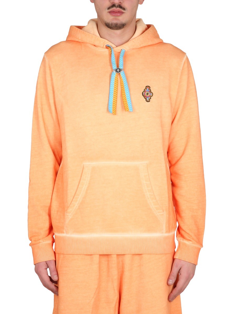 Shop the authentic MARCELO BURLON COUNTY OF MILAN men's SUNSET CROSS REGULAR SWEATSHIRT in orange