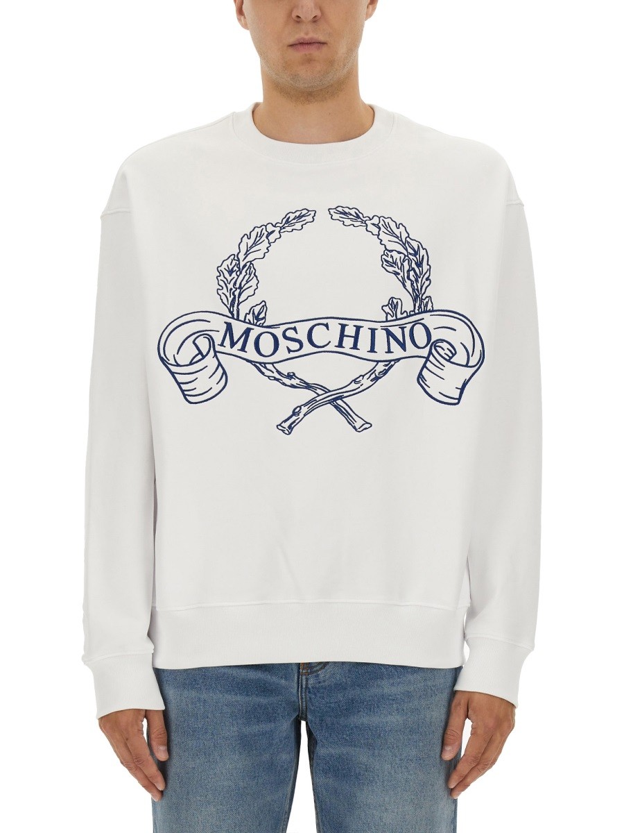 Explore the authentic Moschino men's SWEATSHIRT WITH LAUREL CROWN LOGO EMBROIDERY in White