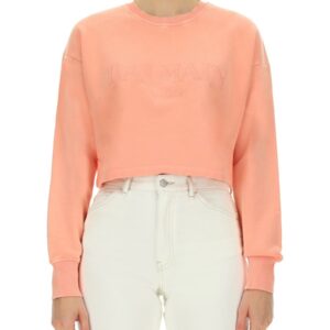 Elevate your look with the Balmain women's SWEATSHIRT WITH LOGO in Pink