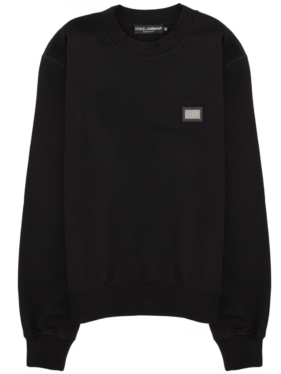 Explore the authentic Dolce & Gabbana men's SWEATSHIRT WITH LOGO PATCH in Black