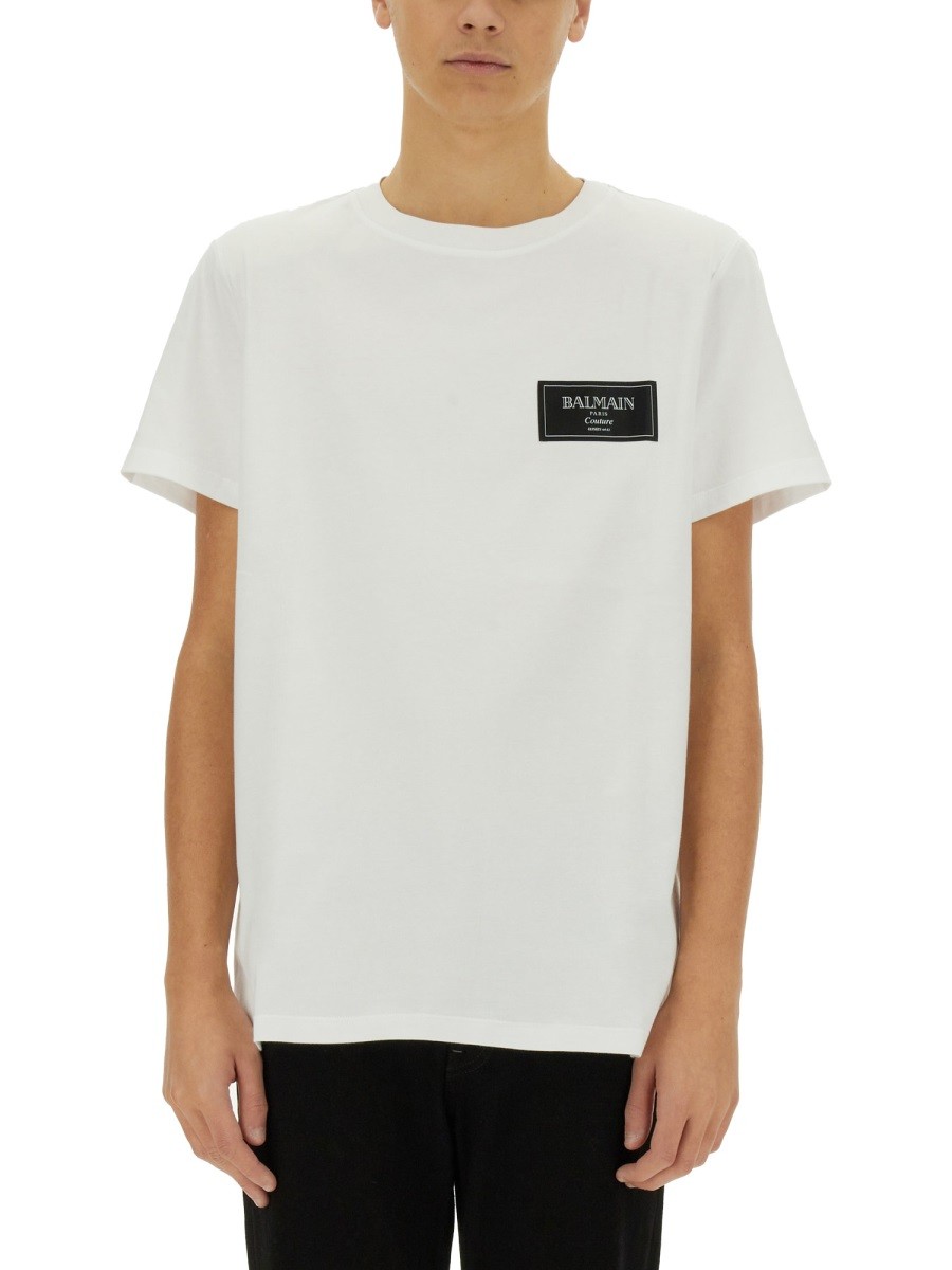 Refresh your wardrobe with the Balmain men's T-SHIRT WITH LOGO in White