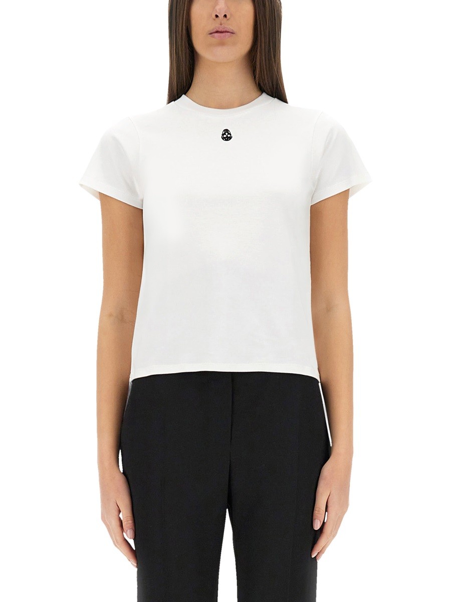 Explore the authentic Alexander Mcqueen women's T-SHIRT WITH "SKULL" EMBROIDERY in White