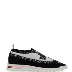 Refresh your wardrobe with the THOM BROWNE men's TECH RUNNER SNEAKER in Black