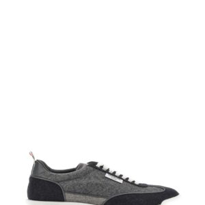 Refresh your wardrobe with the THOM BROWNE men's TECH RUNNER SNEAKER in Grey