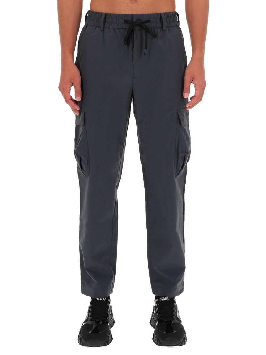 Explore the authentic Versace Jeans Couture men's TECHNICAL CARGO PANTS in Grey