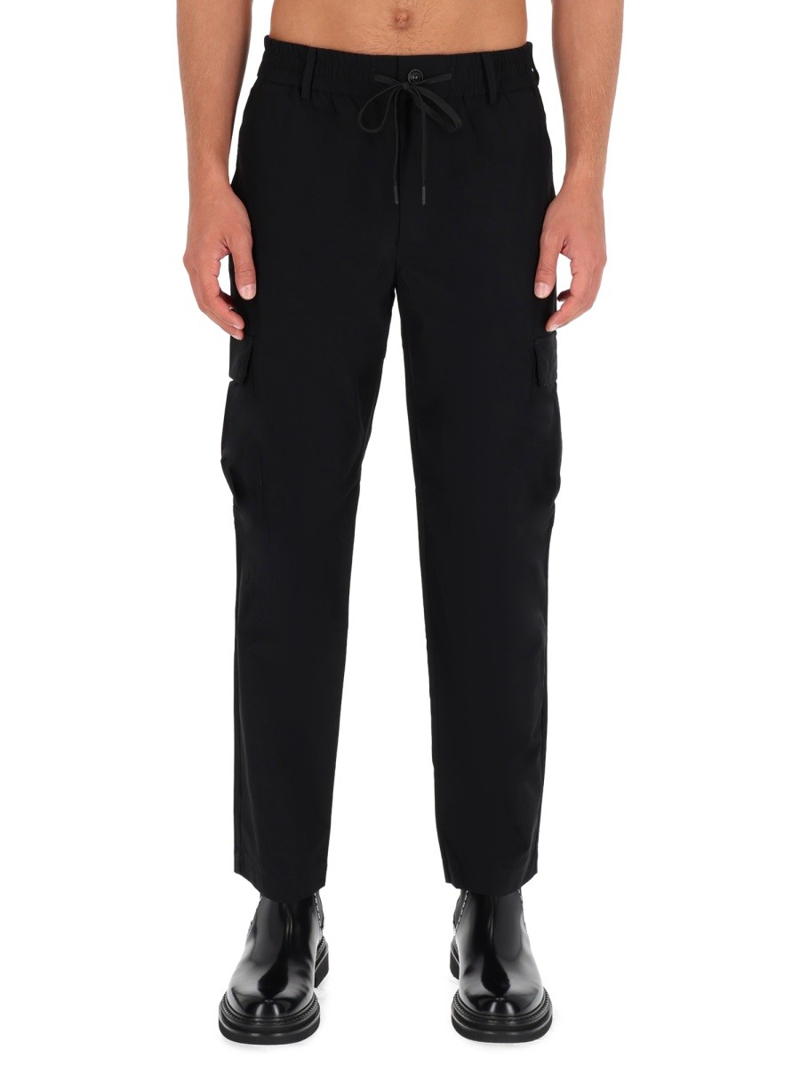 Explore the authentic Versace Jeans Couture men's TECHNICAL CARGO PANTS in Black