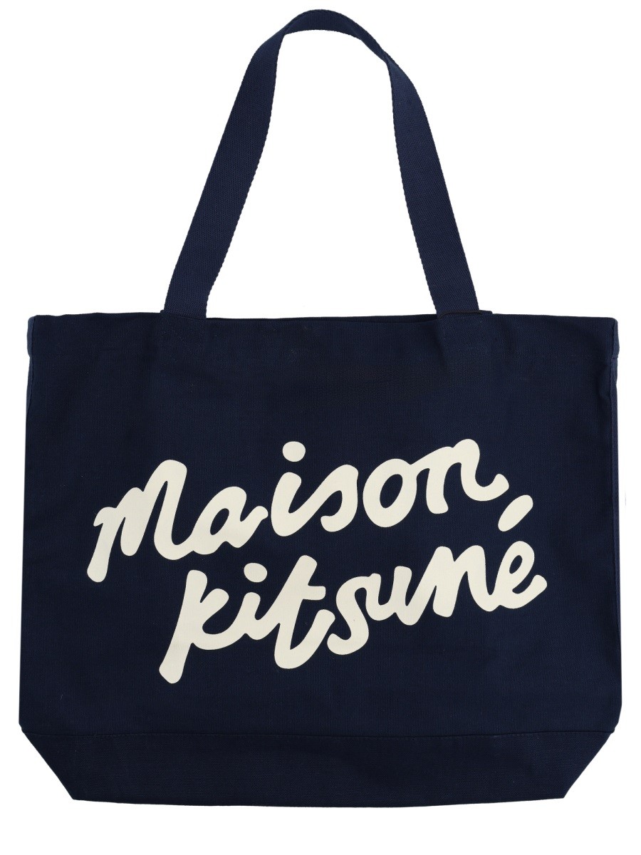 Refresh your wardrobe with the Maison Kitsune men's TOTE BAG WITH WRITING in Blue