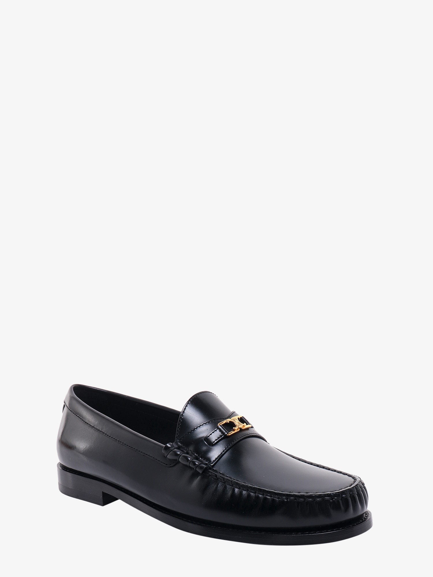 Discover the authentic Celine men's Triomphe 15 leather loafers in Black