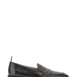 Refresh your wardrobe with the THOM BROWNE men's VARSITY PENNY LOAFER in Black