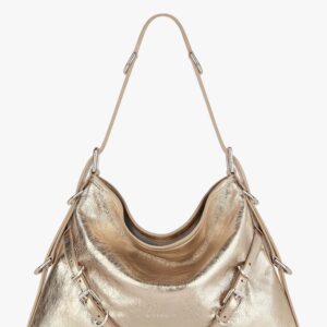 Discover the authentic Givenchy women's Voyou metallized leather shoulder bag in Oro