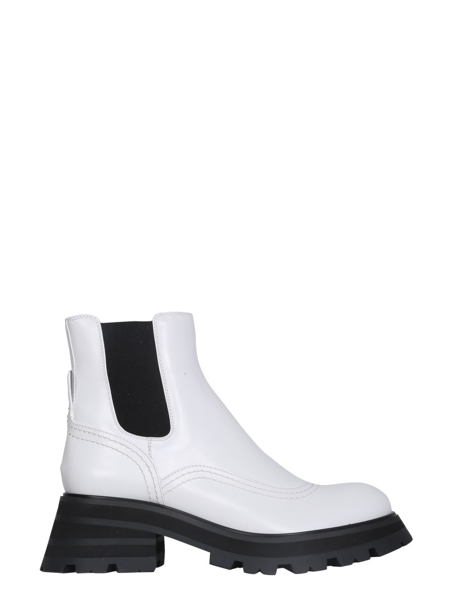 Explore the authentic Alexander Mcqueen women's WANDER CHELSEA BOOTS in Ivory