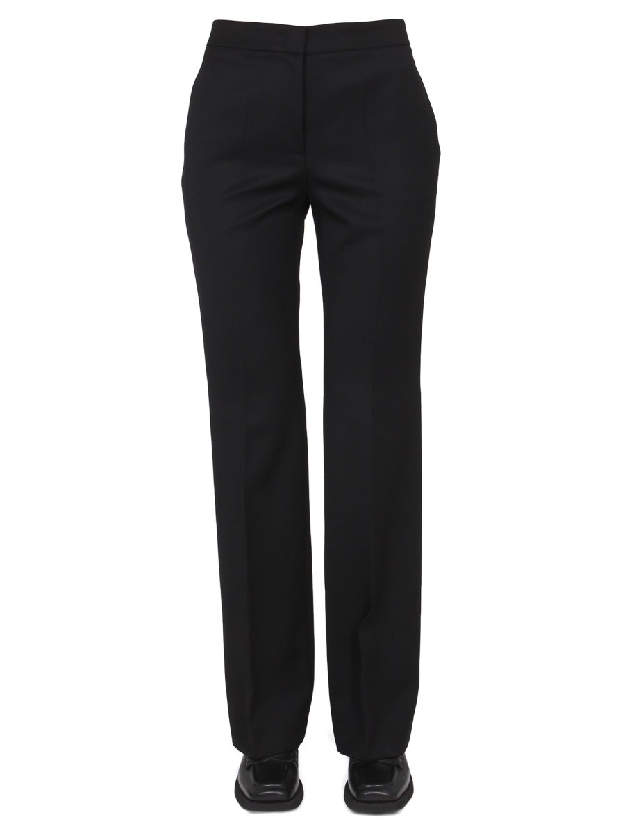 Explore the authentic Moschino women's WOOL GRAIN DE POUDRE PANTS in Black