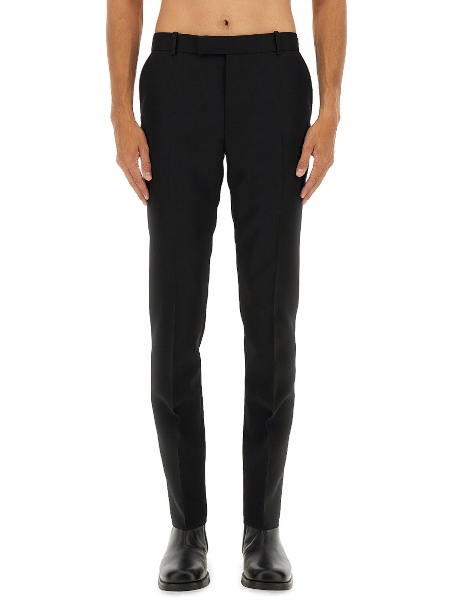 Discover the authentic Alexander Mcqueen men's WOOL PANTS in Black