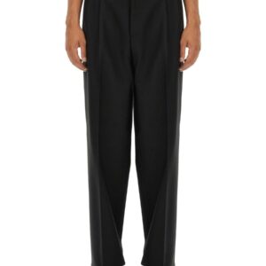 Discover the authentic Versace men's WOOL PANTS in Black