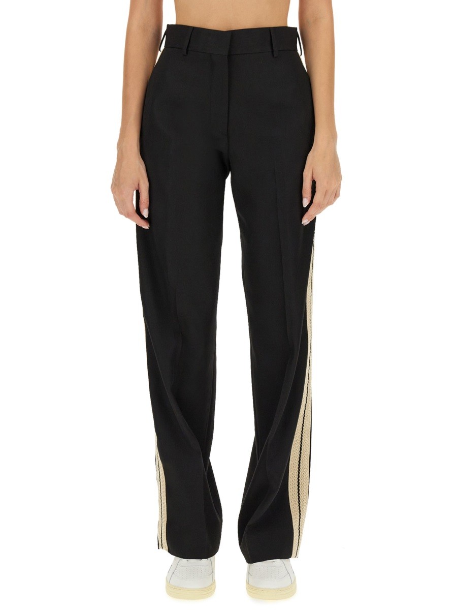 Refresh your wardrobe with the Palm Angels women's WOOL PANTS in Black