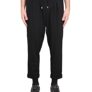 Refresh your wardrobe with the Balmain men's WOOL PANTS in Black